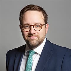 Official portrait of Chris Elmore