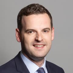 Official portrait of Paul Holmes