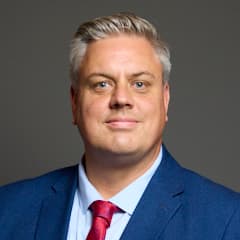 Official portrait of Blair McDougall