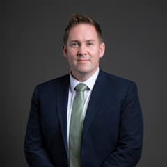 Official portrait of Dr Sam Rushworth