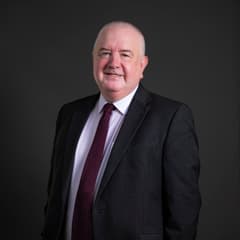 Official portrait of Martin Rhodes