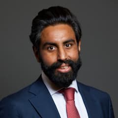 Official portrait of Dr Jeevun Sandher