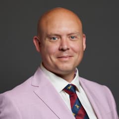 Official portrait of Cameron Thomas